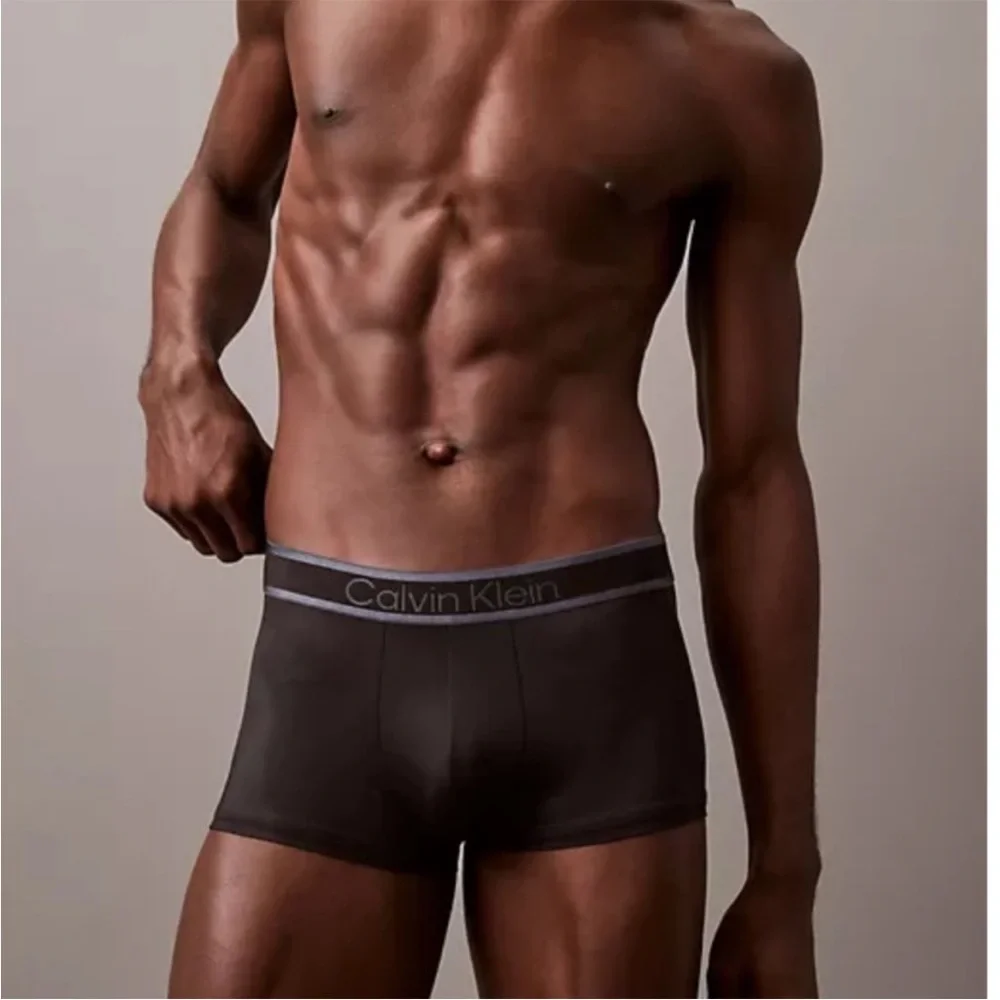 Calvin Klein | Tonal Logo Low Rise Trunks in Black (Medium)